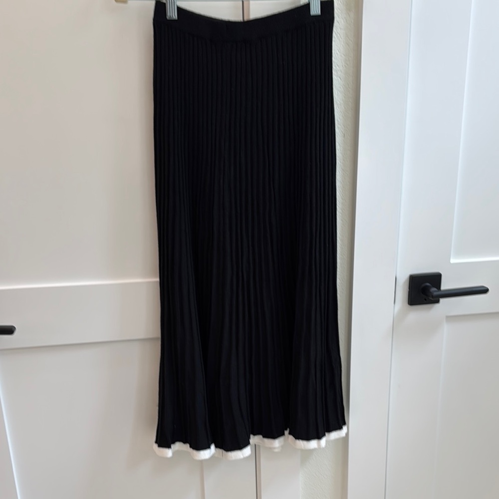 Elegant Black Pleated Skirt with White Trim